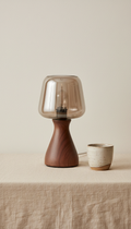 Walnut table lamp with smoked glass shade
