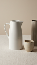 Sleek white ceramic pitcher